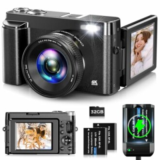 Digital camera with flip screen and accessories.